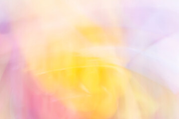 Abstract colorful bright purple pink yellow background, with defocused light and shadow bokeh.