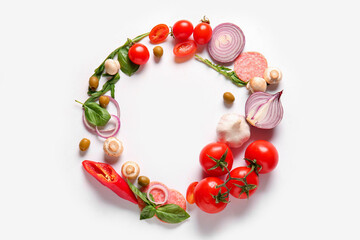 Frame made of ingredients for preparing pizza on white background
