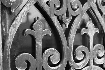 Vintage wrought iron fence in black and white.