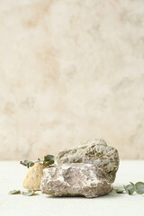 Decorative stone podiums with eucalyptus on white table