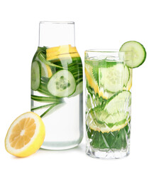 Glass and bottle of infused water with cucumber slices on white background