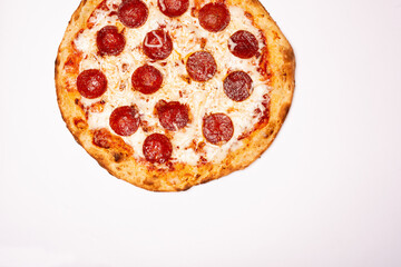 Pepperoni pizza on a white background off centered for ads