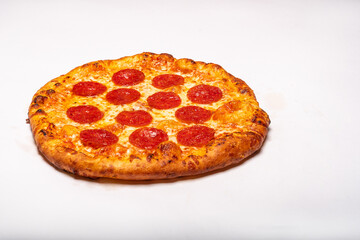 Fresh hot pepperoni pizza on a white background