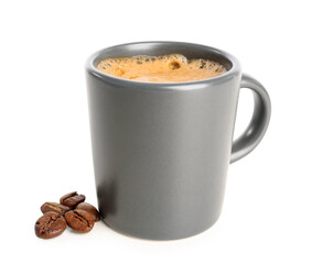 Cup of delicious espresso  with coffee beans on white background