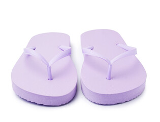 Pair of stylish lilac flip-flops on white background