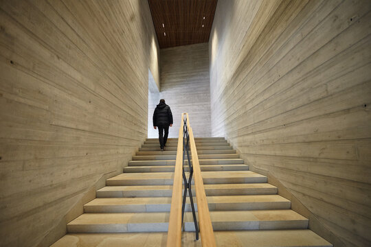 Man walking in concrete stairs