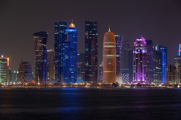 Fototapeta na wymiar Doha skyline at night from corniche, Qatar