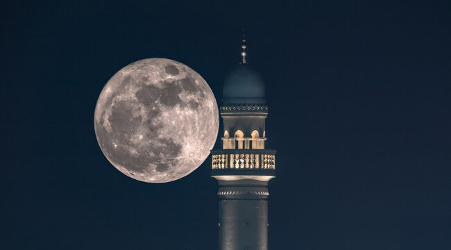 The super moon with a mosque minaret, Doha - Qatar