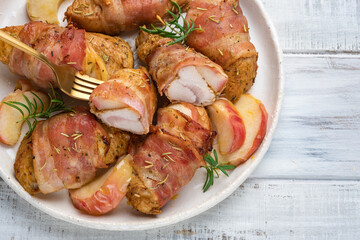 Bacon wrapped turkey or chicken breast with apple slice