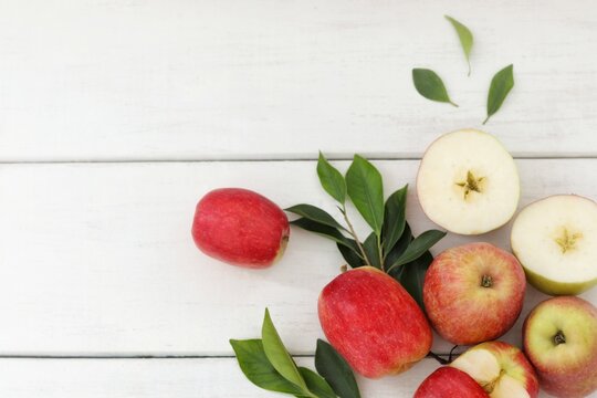 Apples are red, on a white table, fresh fruit, summer, background, background image