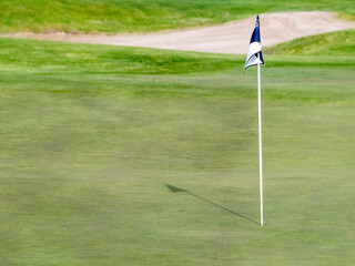 golf course with flag