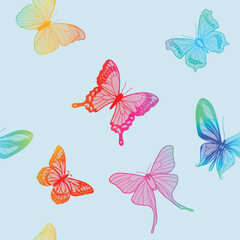 Seamless vector pattern of butterflies in rainbow colors on a light blue background