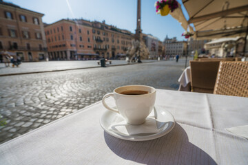 Morning coffee on the background of Piazza Navona in Rome, Italy