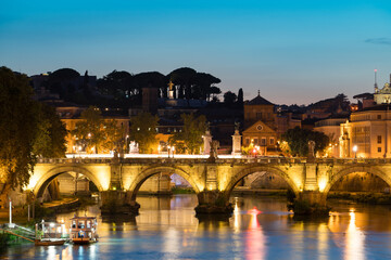 Sant Angelo bridge at sunset in Rome. Italy