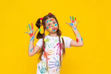 Portrait of a little girl with baby makeup and painted colorful pens, children's creativity, a child showing his dirty hands in cameras, additional drawing courses.