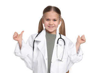 Fototapeta premium Little girl in medical uniform with stethoscope showing thumbs up on white background