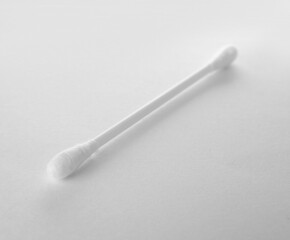 Clean cotton bud isolated on white. Hygienic accessory