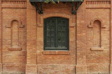 A red brick wall in a vintage style building