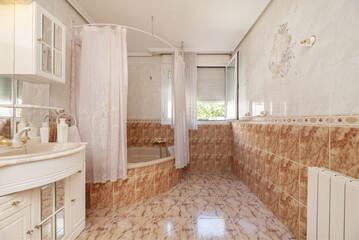 Vintage bathroom with a hydromassage bathtub