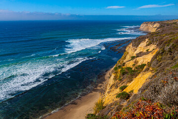 Fototapeta na wymiar The Steep Sea Cliffs at Pescadero State Beach, California, USA