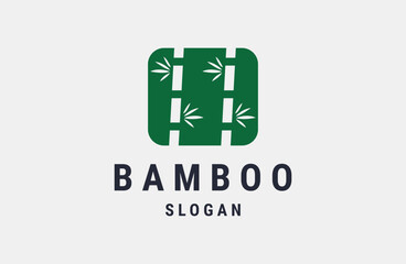 Fototapeta premium Bamboo logo template. Green bamboo tree vector design.