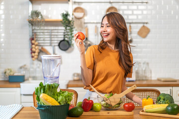 Portrait of beauty body slim healthy asian woman big smile cooking and preparing vegan food healthy holding apple, green apple, dental, teeth, fruit in kitchen at home.Diet.Fitness, healthy food - obrazy, fototapety, plakaty