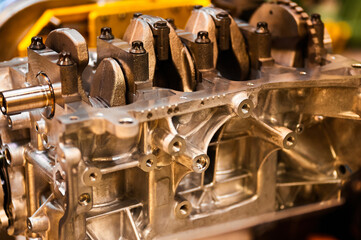 Cylinder block complete with crankshaft. Assembly line of internal combustion engines