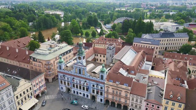 Colorful facade of City Hall at the historic market square Dramatic aerial top view flight 
Budweis Budejovice old town in Czech Republic, summer of 2023. panorama overview drone
4K uhd footage.