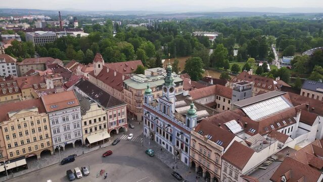 Colorful facade of City Hall at the historic market square Majestic aerial top view flight 
Budweis Budejovice old town in Czech Republic, summer of 2023. panorama orbit drone
4K uhd footage.