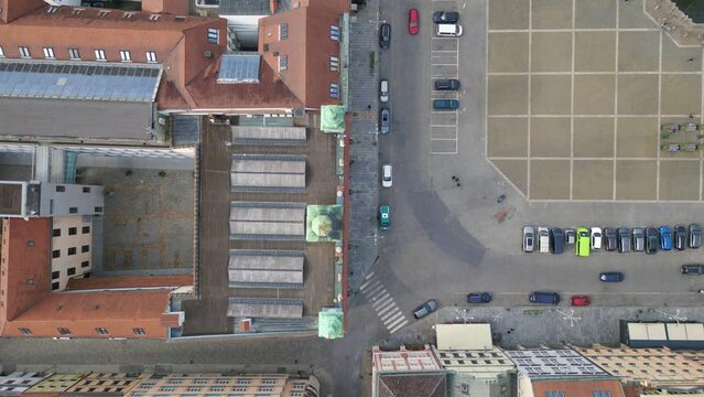 Colorful facade of old town at the historic market square. Perfect aerial top view flight 
Budweis Budejovice old town in Czech Republic, summer of 2023. vertical bird's eye view drone
4K uhd footage.