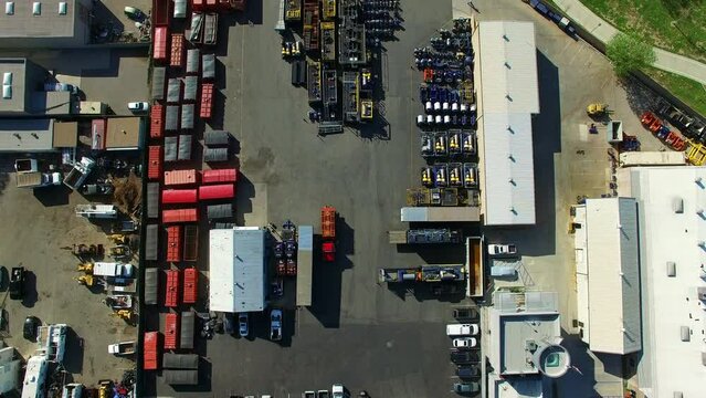 Aerial Top View Of Street By Industrial Compound On Sunny Day, Drone Flying Forward Over City - Long Beach, California