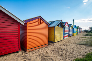 Obraz na płótnie Canvas Rear view of the Bathing boxes at Brighton beach an iconic landmark place of Melbourne, Victoria state of Australia.