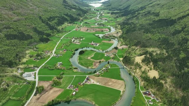 Stunning Stryn River aerial view - Curvy and winding river in lush narrow valley Nordfjord - Oppstrynsvatnet lake seen in top of frame - Aerial
