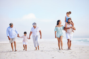 Big family, grandparents walking or kids on beach with young siblings holding hands on holiday together. Dad, mom or children love bonding, smiling or relaxing with senior grandmother or grandfather