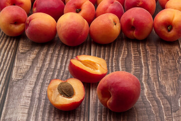 Fototapeta na wymiar Fresh apricot isolated on wooden table
