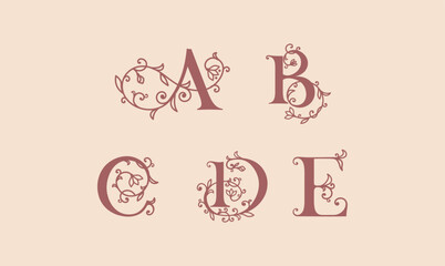 Floral alphabet logo set. Rose flowers in design. Delicate monograms for wedding, boutique, flower business, fashion