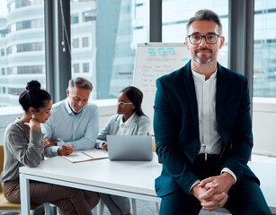 Portrait, leadership and business man, ceo or entrepreneur in office meeting, company and team....