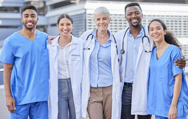 Doctor team, city and hug with diversity and happy nurse from healthcare and wellness work. Urban,...