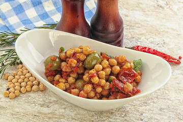Chickpea beans with dry tomato and olives