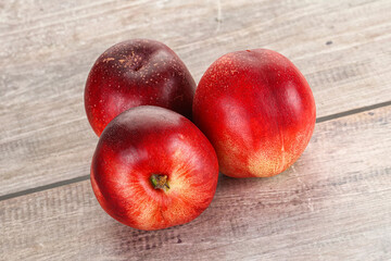Ripe sweet juicy nectarines heap