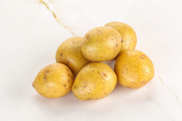 Raw young baby potato heap