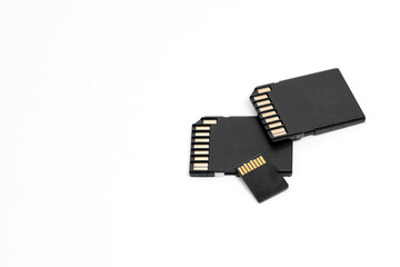 Set of small black sd memory (flash) cards with copyspace on a white.