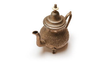 Old kettle on white background