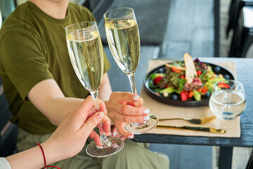 woman drinking champagne in the restaurant,