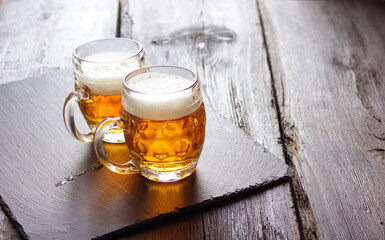 light beer in glass mugs