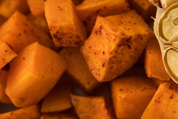 Baked sweet potato slices close-up. Healthy eating. Vegan dish.