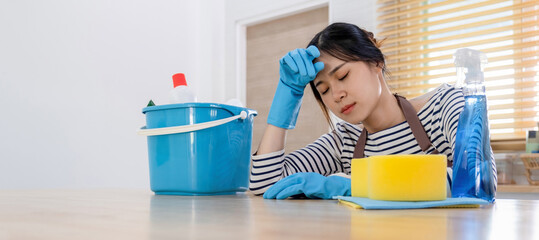 Woman, housewife tired from cleaning house.