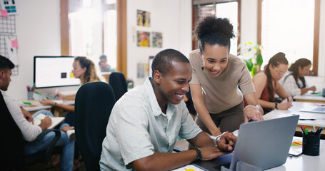 Developer, colleagues discussing and laptop at desk in office at their coworking space. Teamwork,...