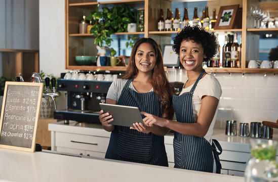 Happy woman, tablet and portrait of waitress team at cafe for inventory, checking stock or order at restaurant. Barista women or small business teamwork on technology at coffee shop in online service