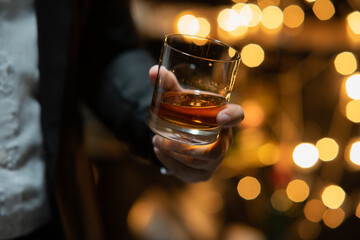  Barman pouring whiskey whiskey glass celebrate whiskey on a friendly party in  restaurant